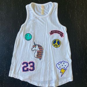 Tank with raised emblems